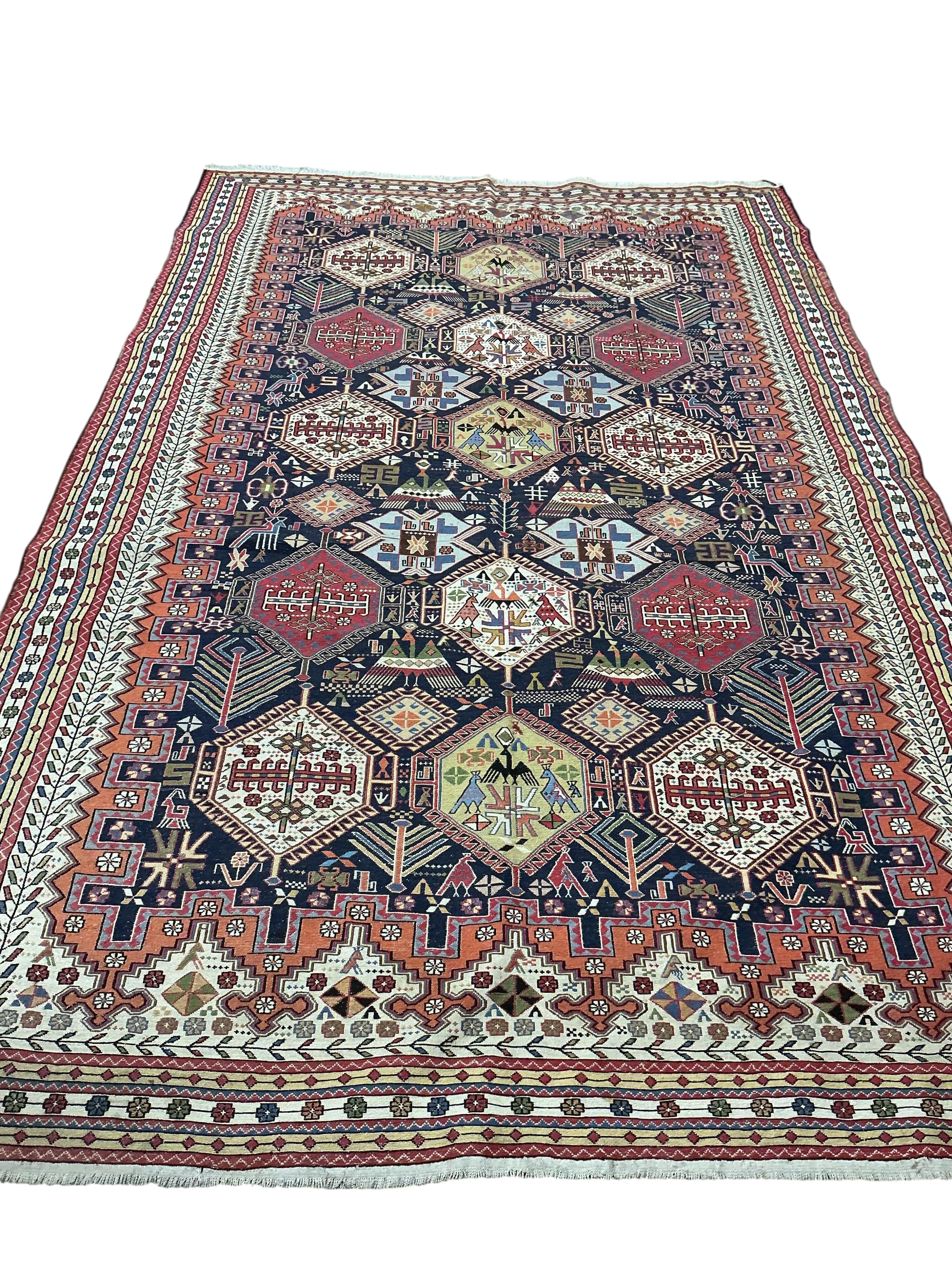 A Soumak blue ground carpet, 300 x 200cm